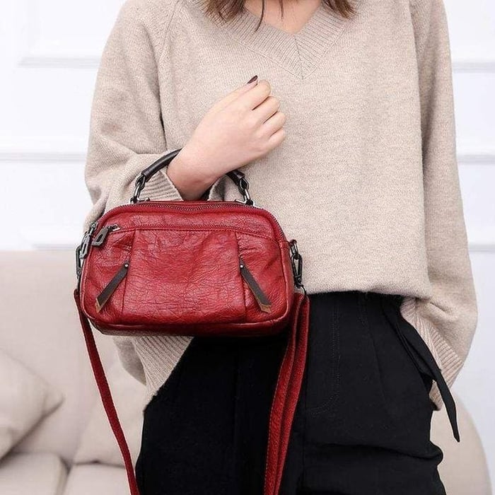 Finbjørg | Kleine und vielseitige Tasche in goldenem Cognac-Ton für Damen