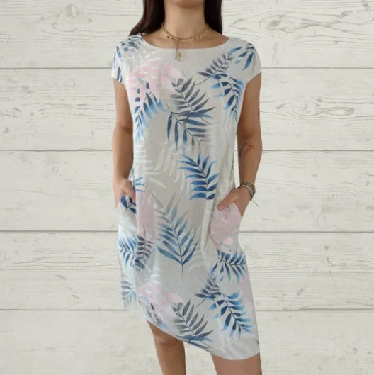 Sommerkleid für Damen mit Taschen und lebhaftem Druck und Blumenmuster