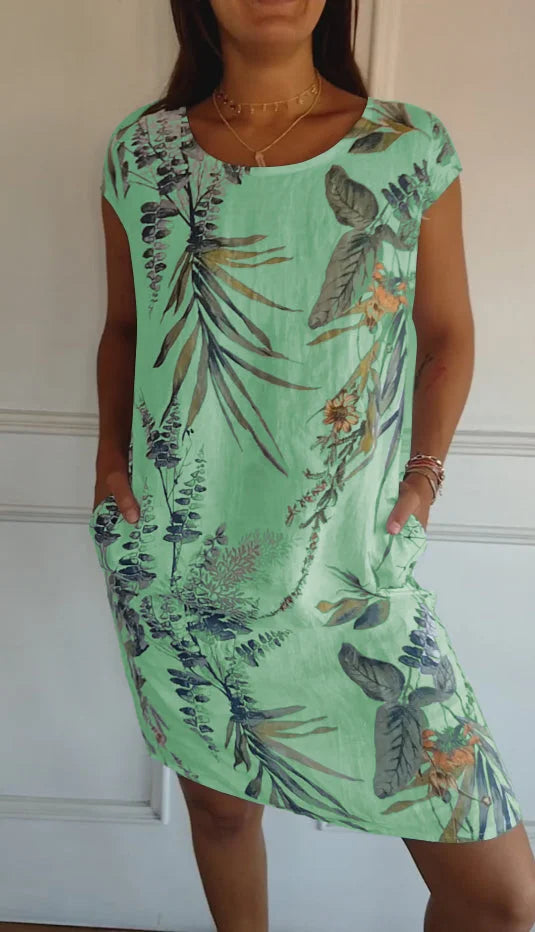 Sommerkleid für Damen mit Taschen und lebhaftem Druck und Blumenmuster