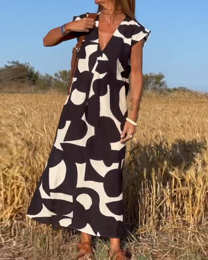 Kendall | Lässiges Abstract Midikleid für Damen mit V-Ausschnitt und kurzen Ärmeln