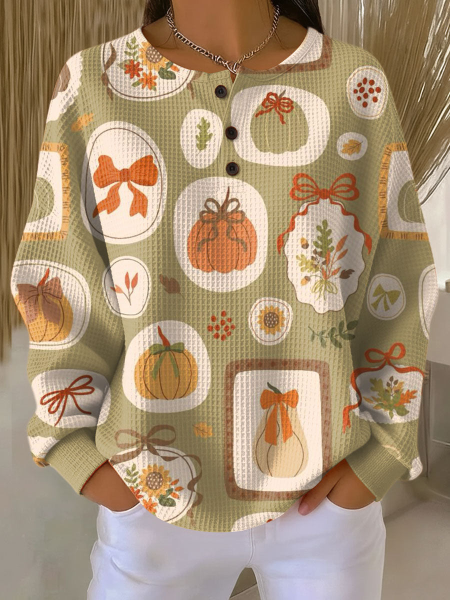 Freja | Herbstpullover für Damen mit Schleifen und Kürbissen