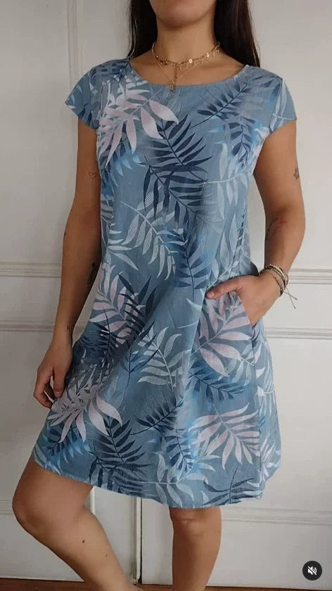 Sommerkleid für Damen mit Taschen und lebhaftem Druck und Blumenmuster