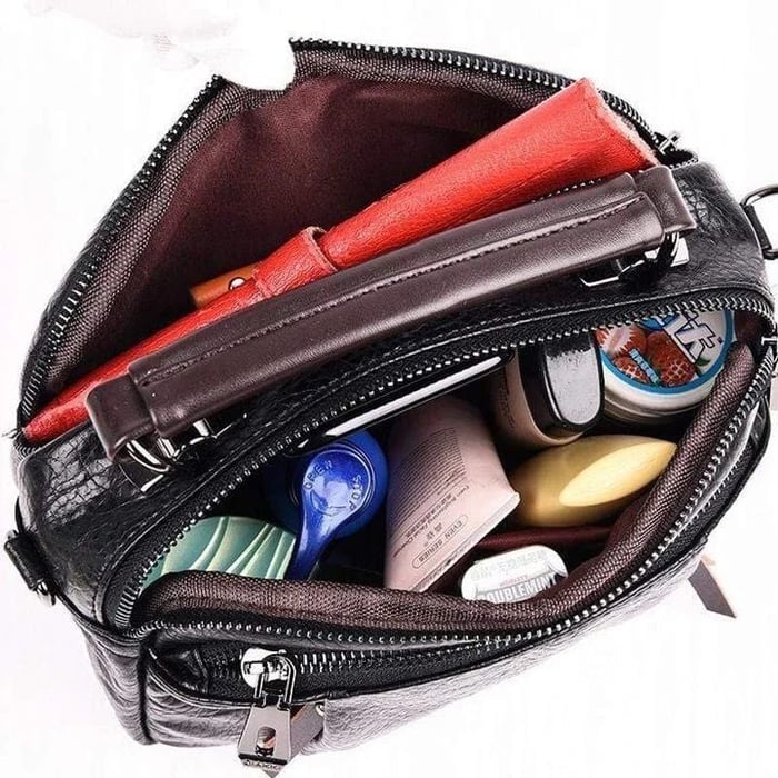 Finbjørg | Kleine und vielseitige Tasche in goldenem Cognac-Ton für Damen