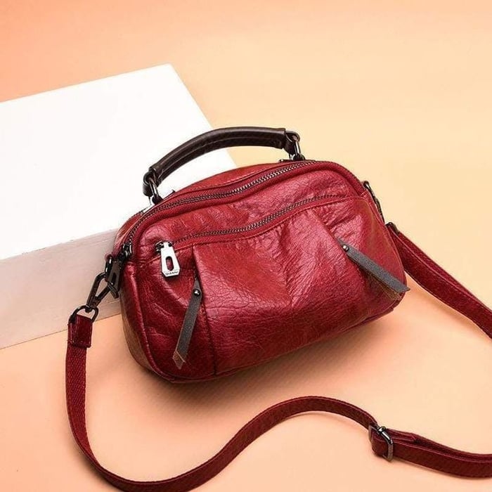Finbjørg | Kleine und vielseitige Tasche in goldenem Cognac-Ton für Damen