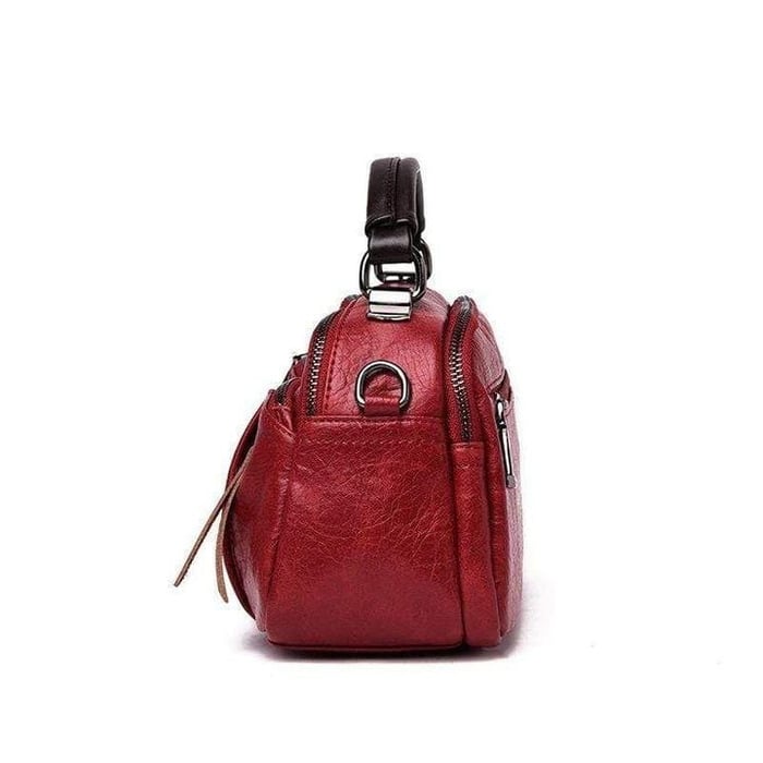Finbjørg | Kleine und vielseitige Tasche in goldenem Cognac-Ton für Damen