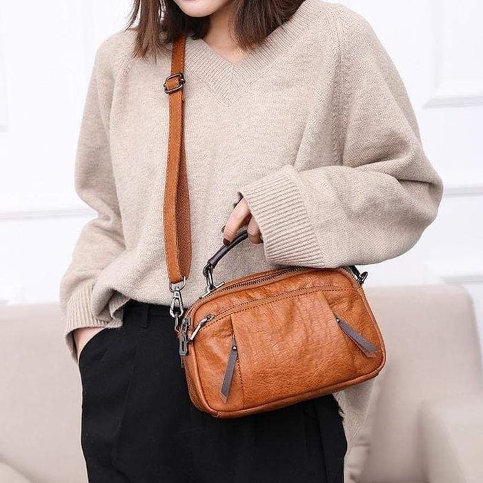Finbjørg | Kleine und vielseitige Tasche in goldenem Cognac-Ton für Damen