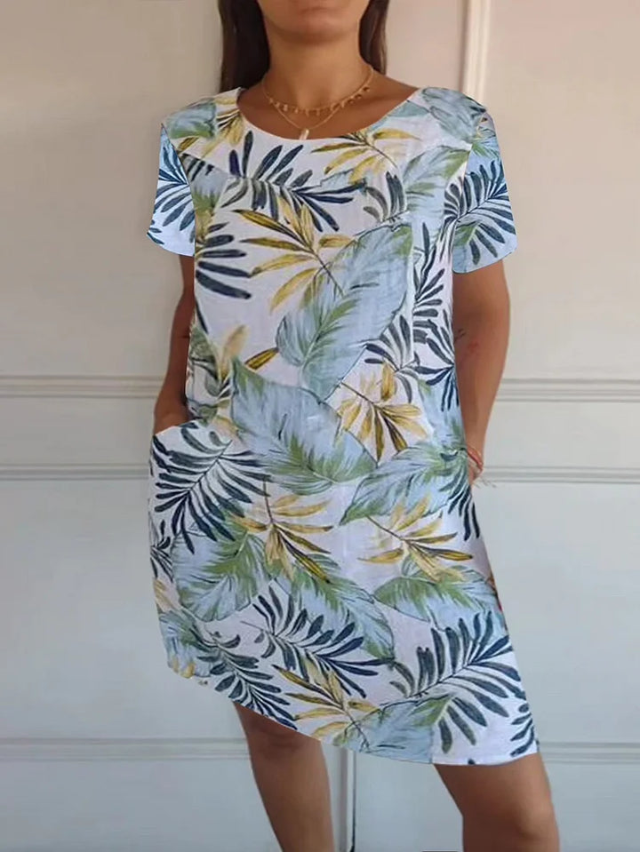 Sommerkleid für Damen mit Taschen und lebhaftem Druck und Blumenmuster