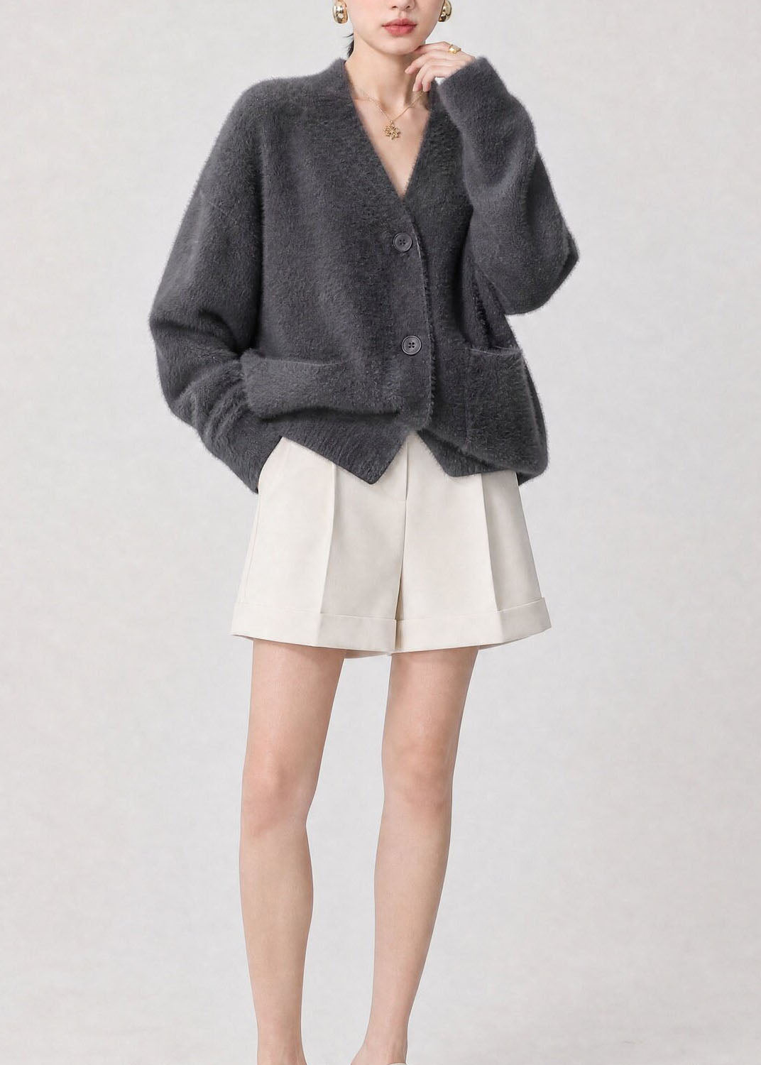 Damen Strickjacke mit Knöpfen, Taschen und V-Ausschnitt