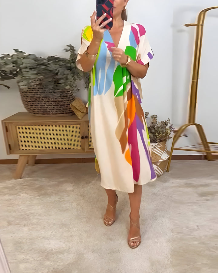 Rianna | Kleid für Damen mit abstraktem Druck, V-Ausschnitt und kurzen Ärmeln