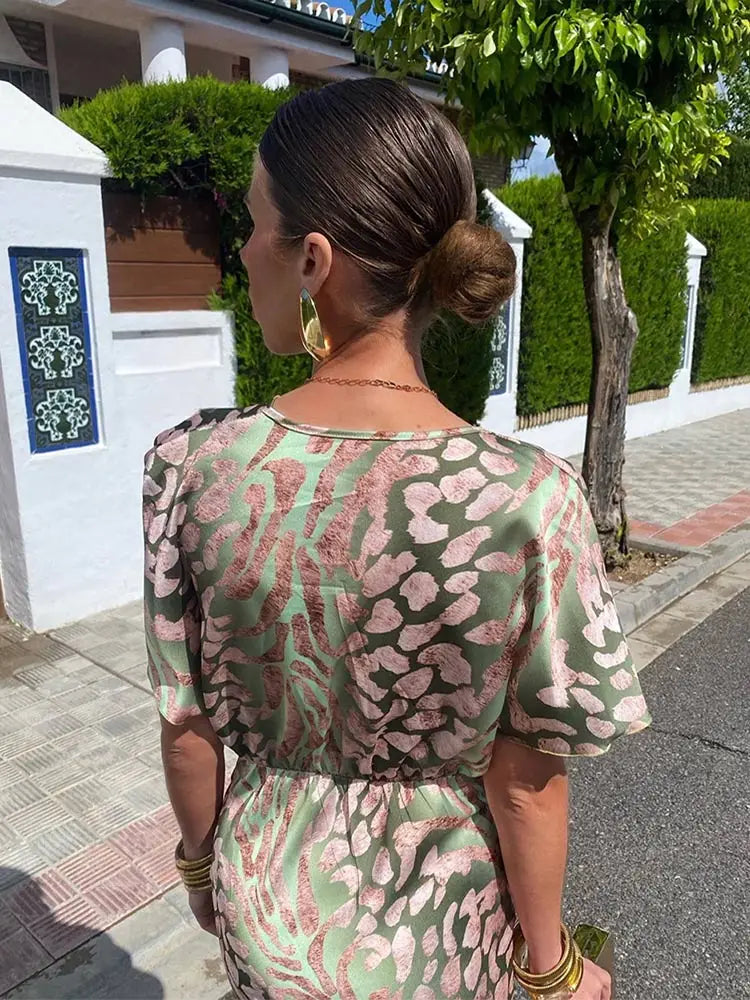 Clarandra | Midi-Kleid in Kupfer für Damen mit Blumenmuster und V-Ausschnitt