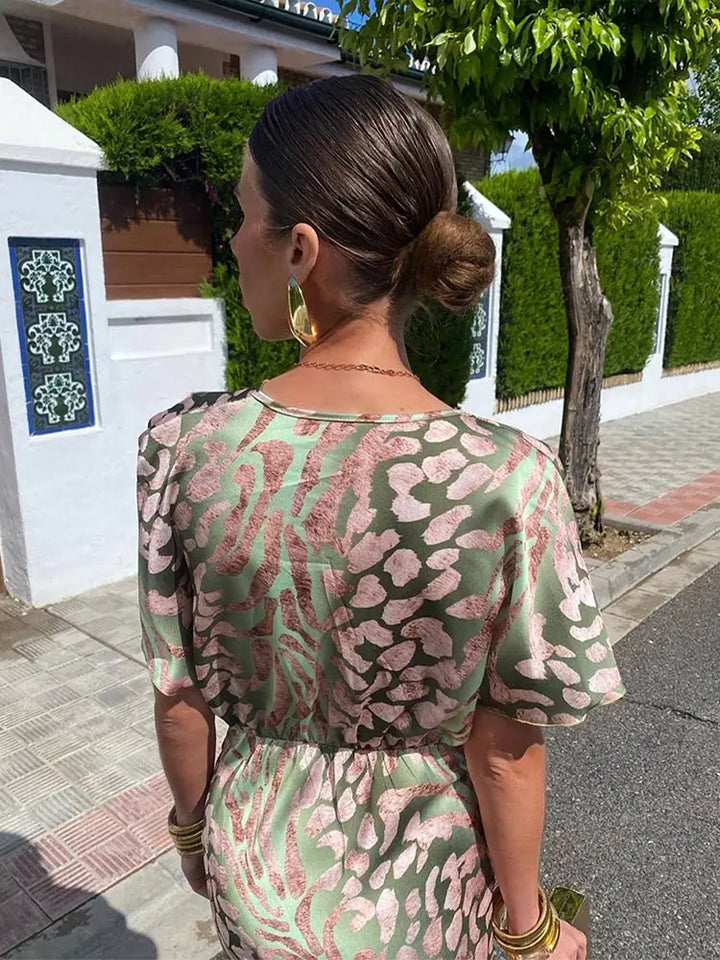 Clarandra | Midi-Kleid in Kupfer für Damen mit Blumenmuster und V-Ausschnitt