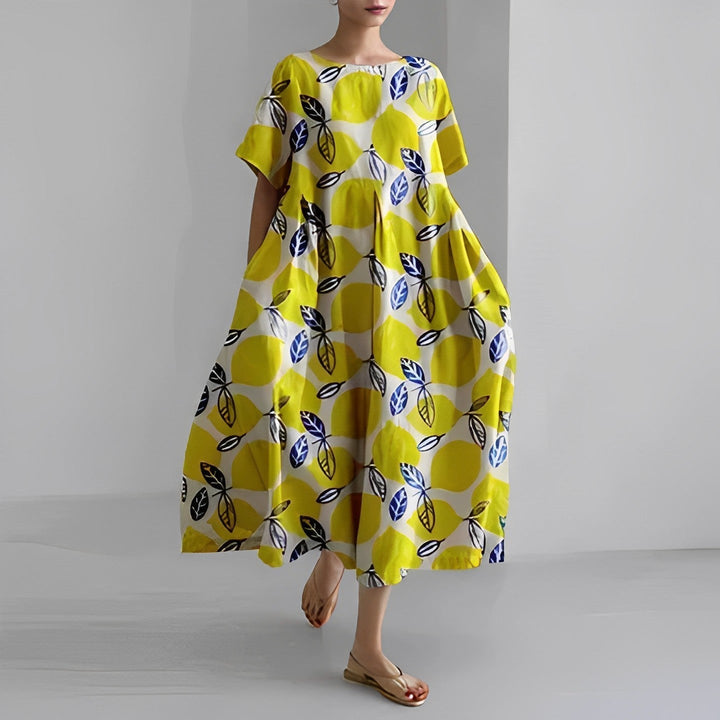 Floria | Lebhaftes Blumenkleid für Damen mit Rundhalsausschnitt und kurzen Ärmeln