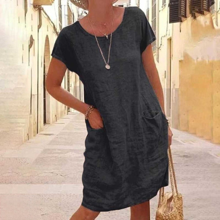 Greta | Damen-Minikleid mit kurzen Ärmeln, Rundhalsausschnitt und Taschen