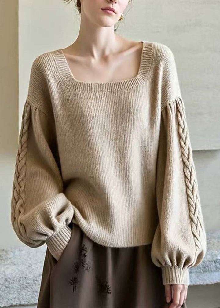 Jersey de mujer con mangas abullonadas y escote cuadrado