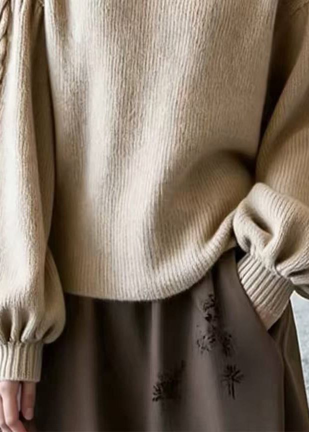 Jersey de mujer con mangas abullonadas y escote cuadrado