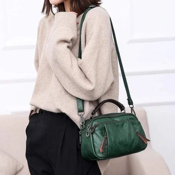 Finbjørg | Kleine und vielseitige Tasche in goldenem Cognac-Ton für Damen