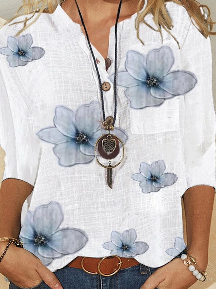 Damenbluse mit floralem V-Ausschnitt und Knopfleiste