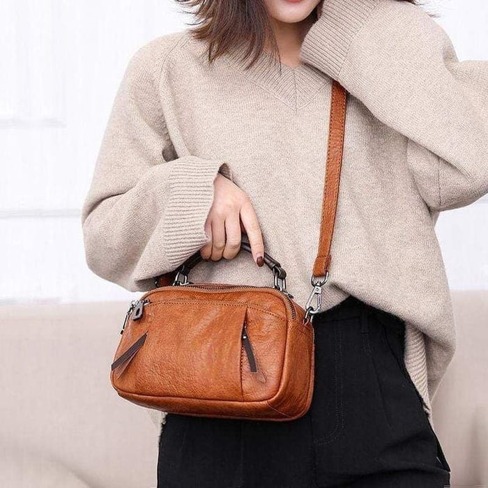 Finbjørg | Kleine und vielseitige Tasche in goldenem Cognac-Ton für Damen