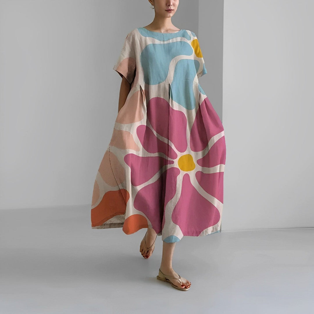 Floria | Lebhaftes Blumenkleid für Damen mit Rundhalsausschnitt und kurzen Ärmeln