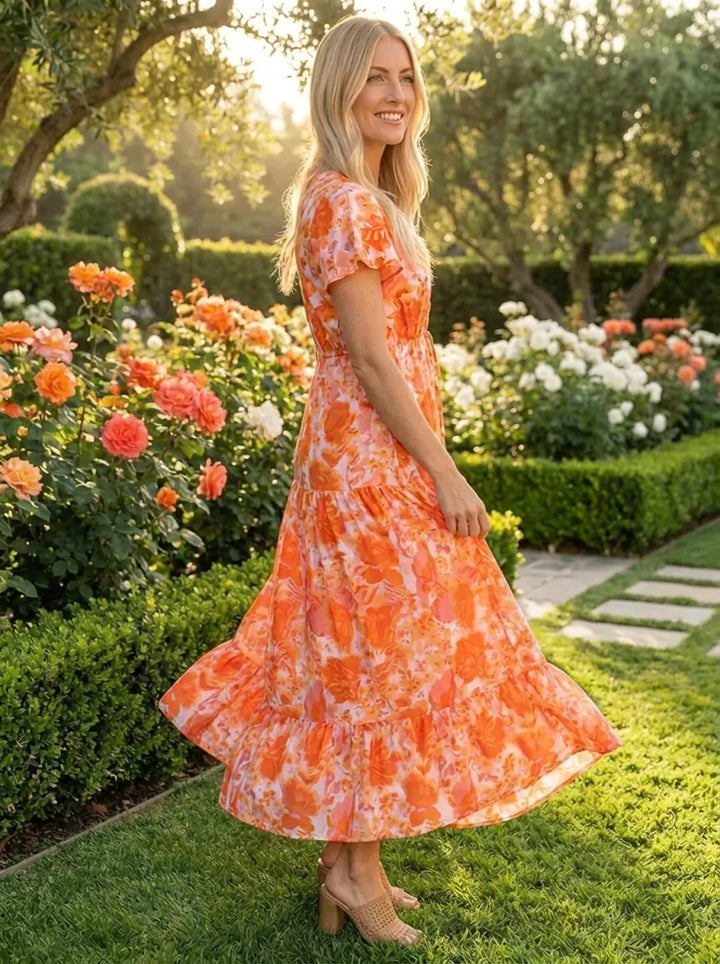 Stilvolles Gigi Druckkleid für Damen mit V-Ausschnitt und kurzen Ärmeln