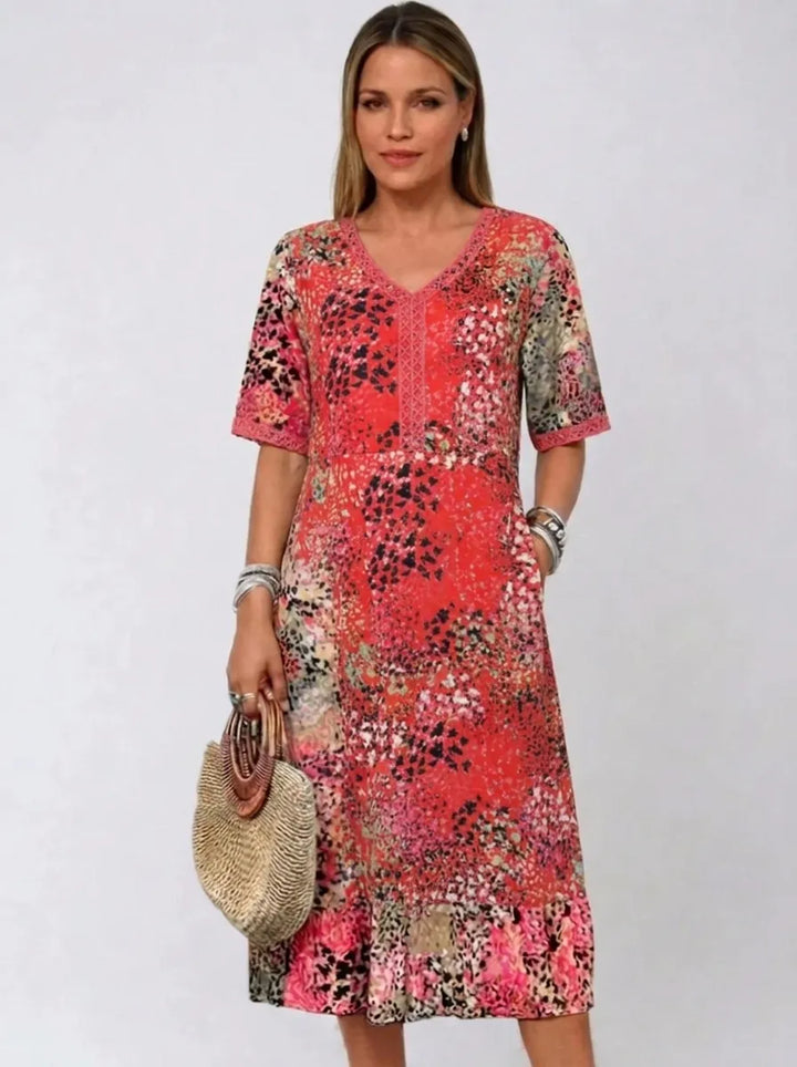 Fatima | Kleid für Damen mit Blumenmuster, V-Ausschnitt und kurzen Ärmeln