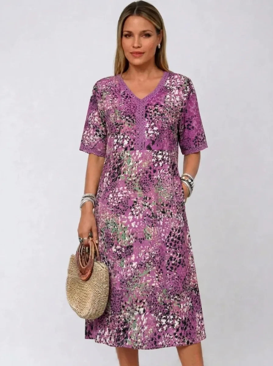 Fatima | Kleid für Damen mit Blumenmuster, V-Ausschnitt und kurzen Ärmeln