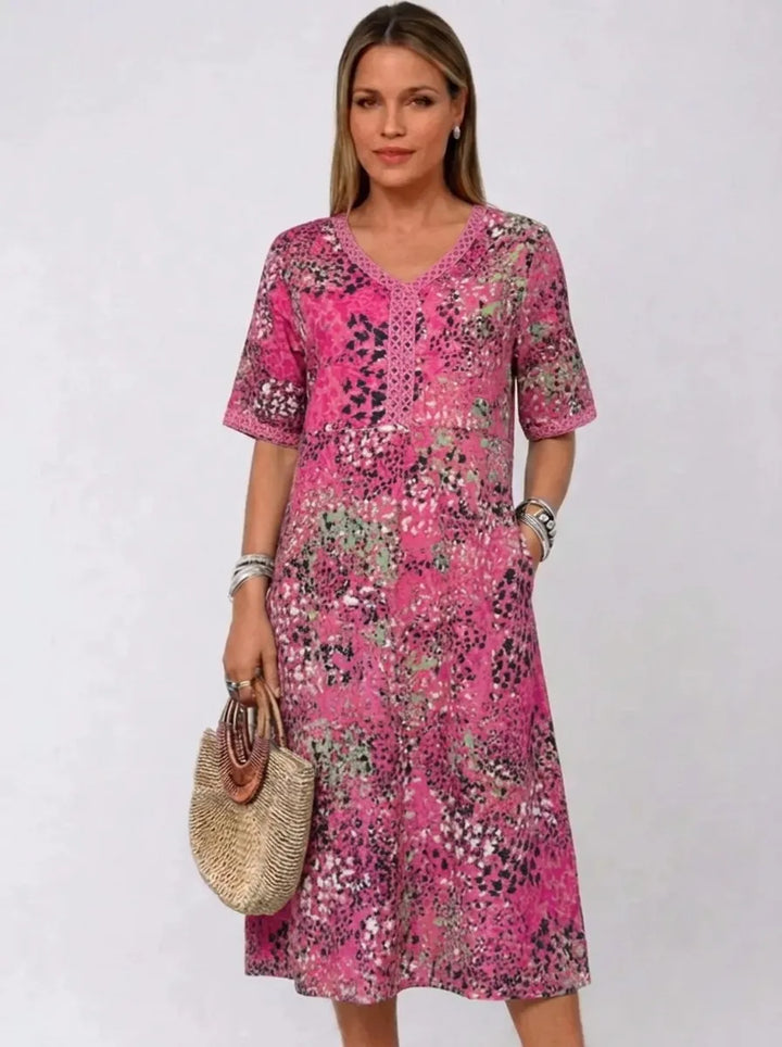 Fatima | Kleid für Damen mit Blumenmuster, V-Ausschnitt und kurzen Ärmeln
