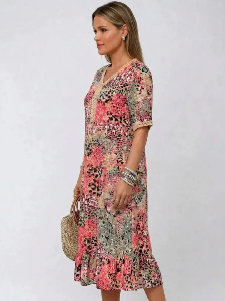 Fatima | Kleid für Damen mit Blumenmuster, V-Ausschnitt und kurzen Ärmeln
