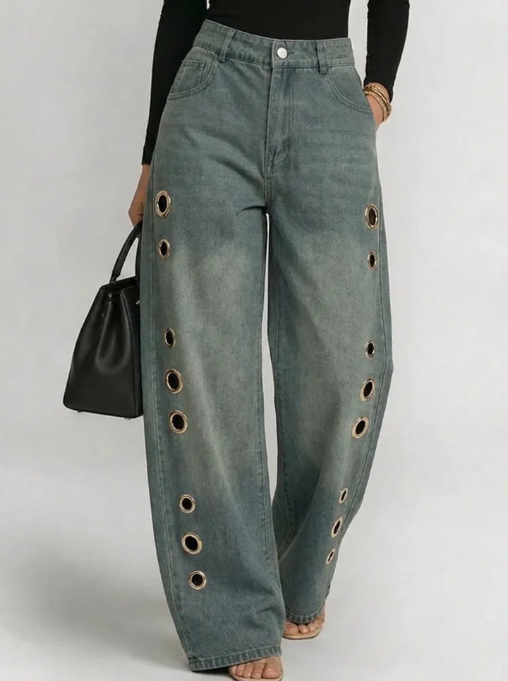 Weite Denim-Hosen für Damen mit goldenen Ösen-Seitenausschnitten