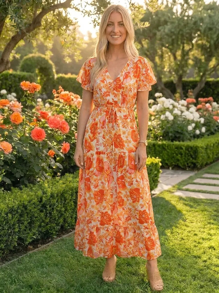 Stilvolles Gigi Druckkleid für Damen mit V-Ausschnitt und kurzen Ärmeln