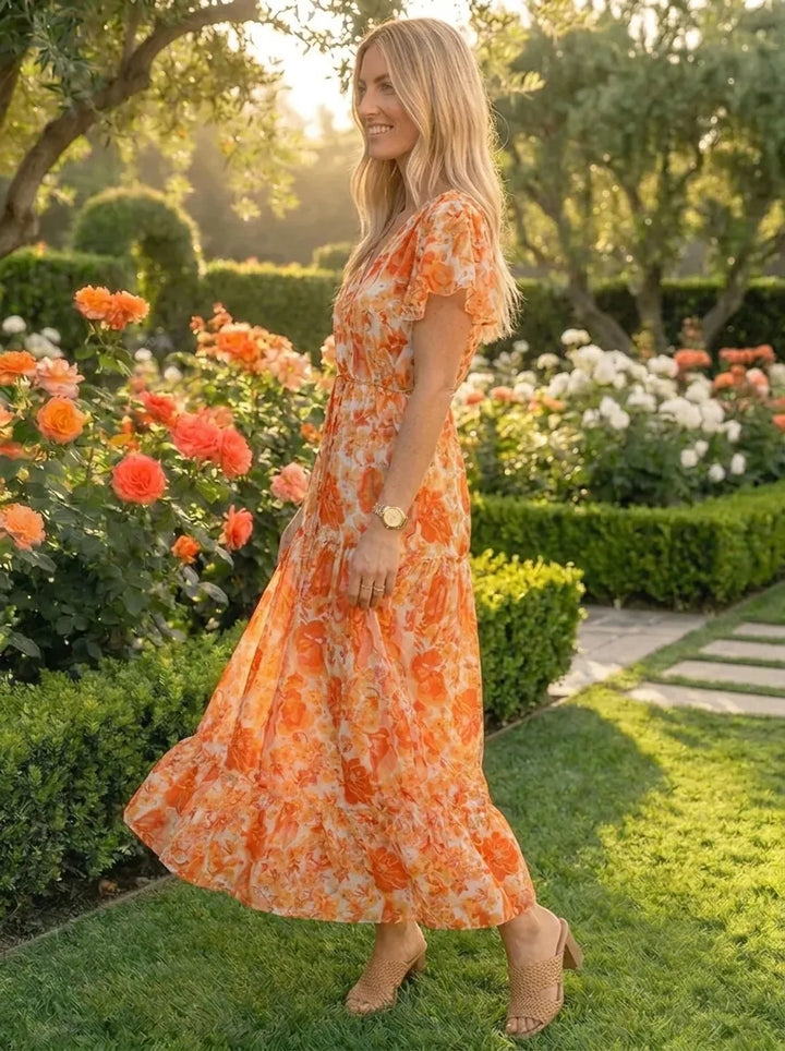 Stilvolles Gigi Druckkleid für Damen mit V-Ausschnitt und kurzen Ärmeln