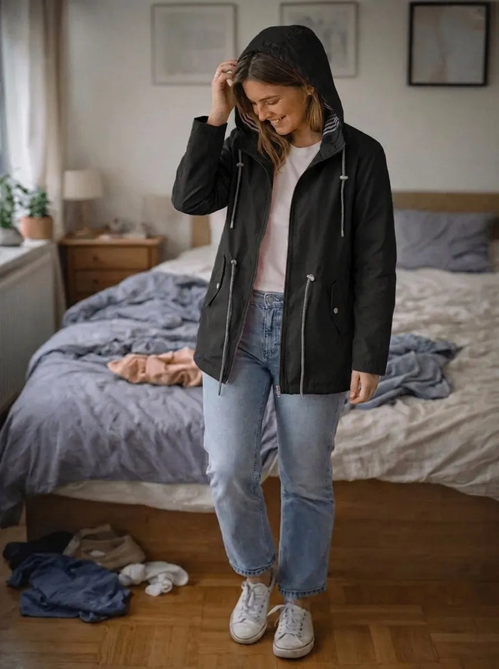 Impermeabile da donna con maniche lunghe, cappuccio e tasche