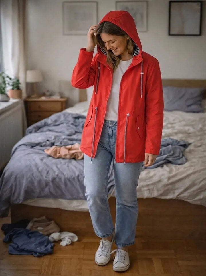 Impermeabile da donna con maniche lunghe, cappuccio e tasche