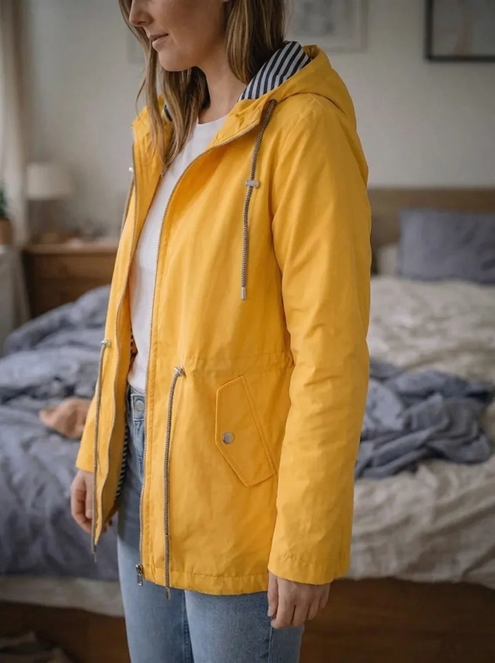 Impermeabile da donna con maniche lunghe, cappuccio e tasche