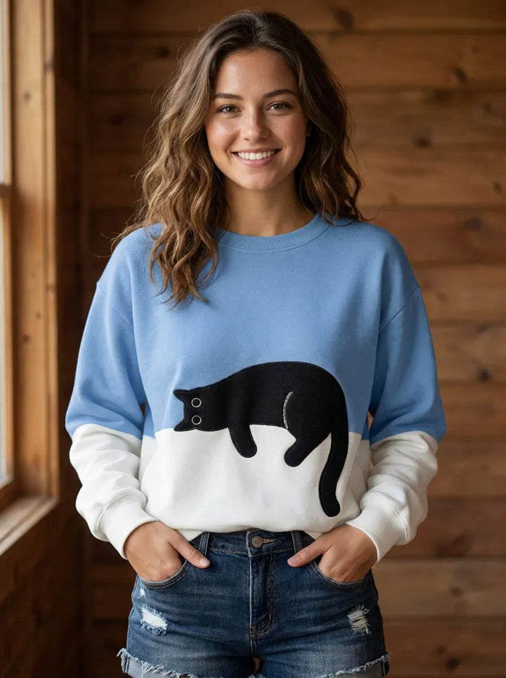 Jersey oversize de mujer con motivo de gatos y diseño de bloques de color