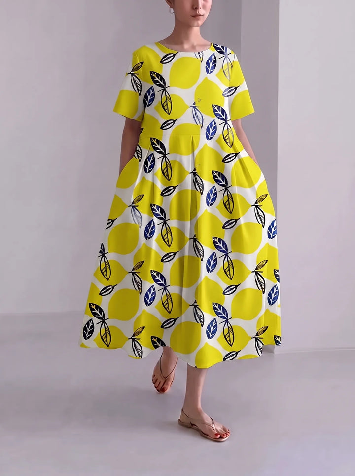 Floria | Robe fleurie vive pour femme avec encolure ronde et manches courtes