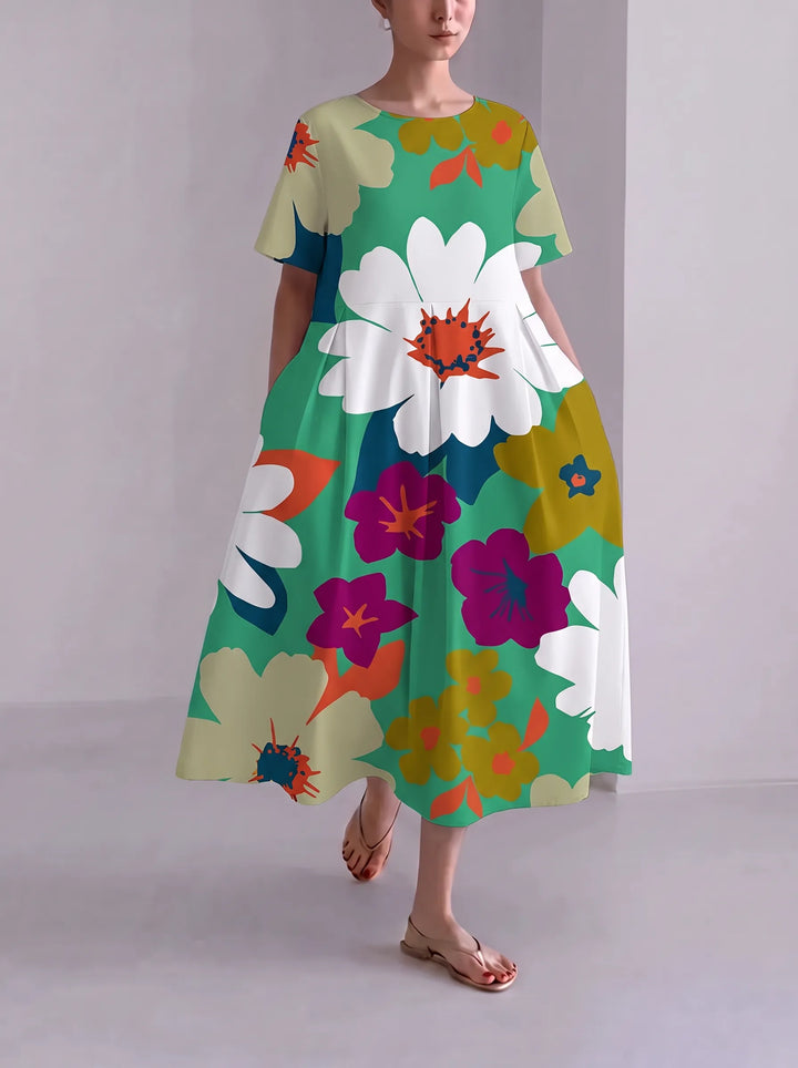 Floria | Robe fleurie vive pour femme avec encolure ronde et manches courtes