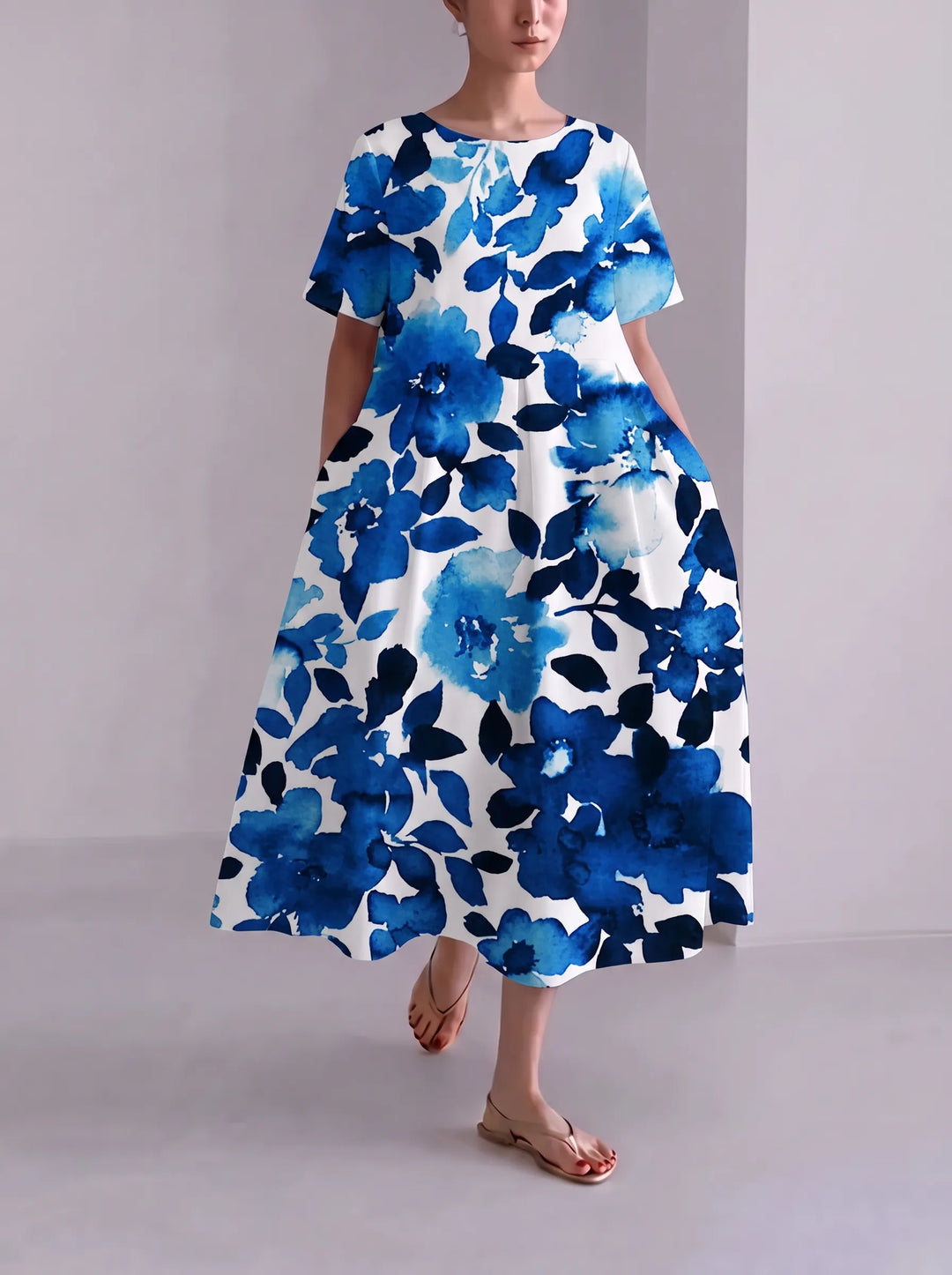 Floria | Robe fleurie vive pour femme avec encolure ronde et manches courtes
