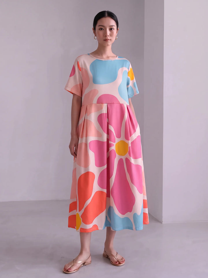 Floria | Robe fleurie vive pour femme avec encolure ronde et manches courtes