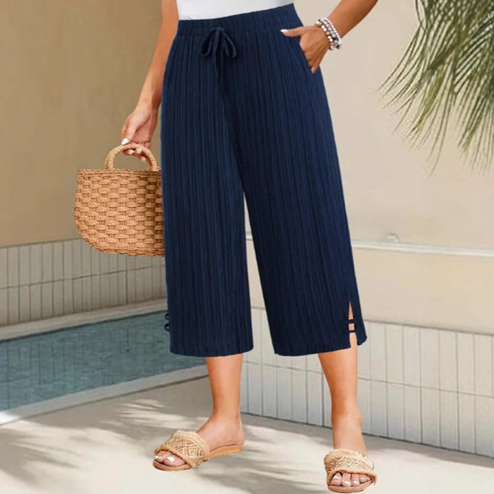 Weite Capri-Hosen für Damen mit praktischen Taschen und mittlerem Bund