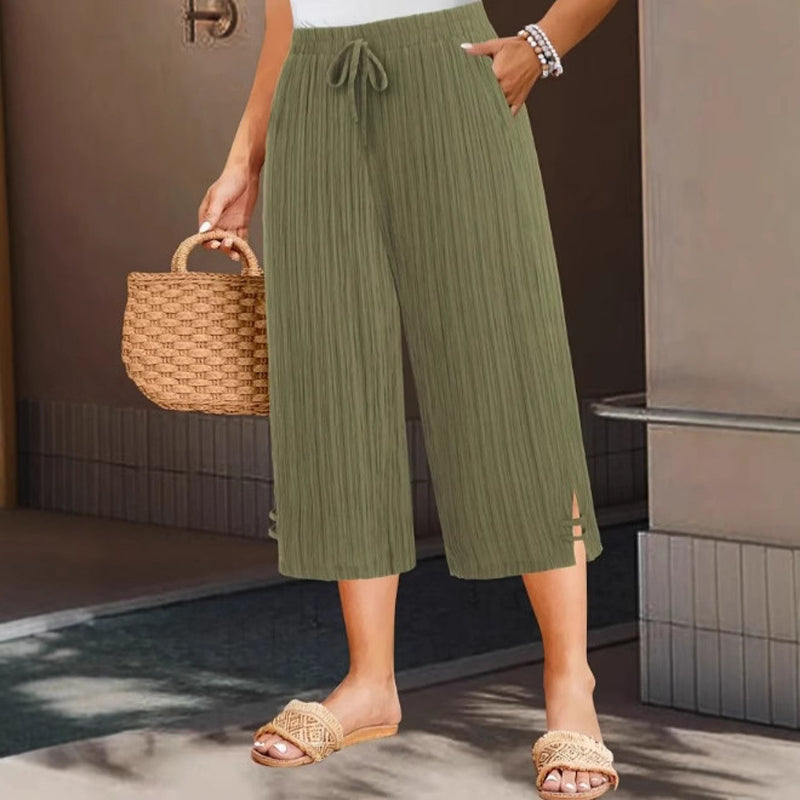 Weite Capri-Hosen für Damen mit praktischen Taschen und mittlerem Bund