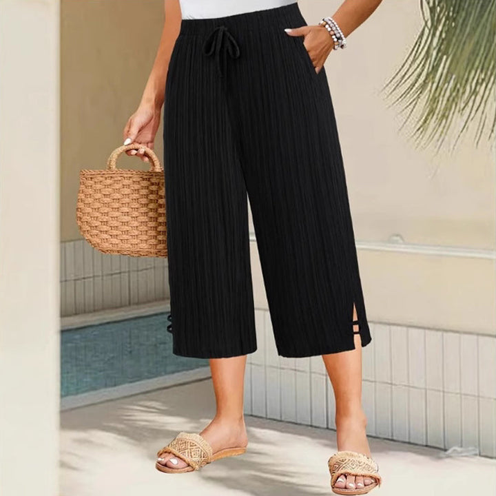 Weite Capri-Hosen für Damen mit praktischen Taschen und mittlerem Bund