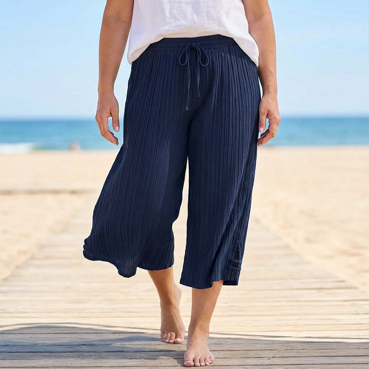 Weite Capri-Hosen für Damen mit praktischen Taschen und mittlerem Bund