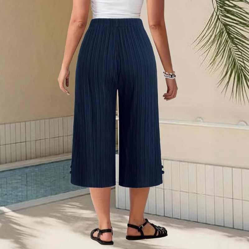 Weite Capri-Hosen für Damen mit praktischen Taschen und mittlerem Bund